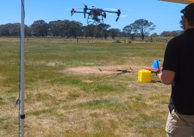 Spray Drone Pilot taking off for weed spray operation